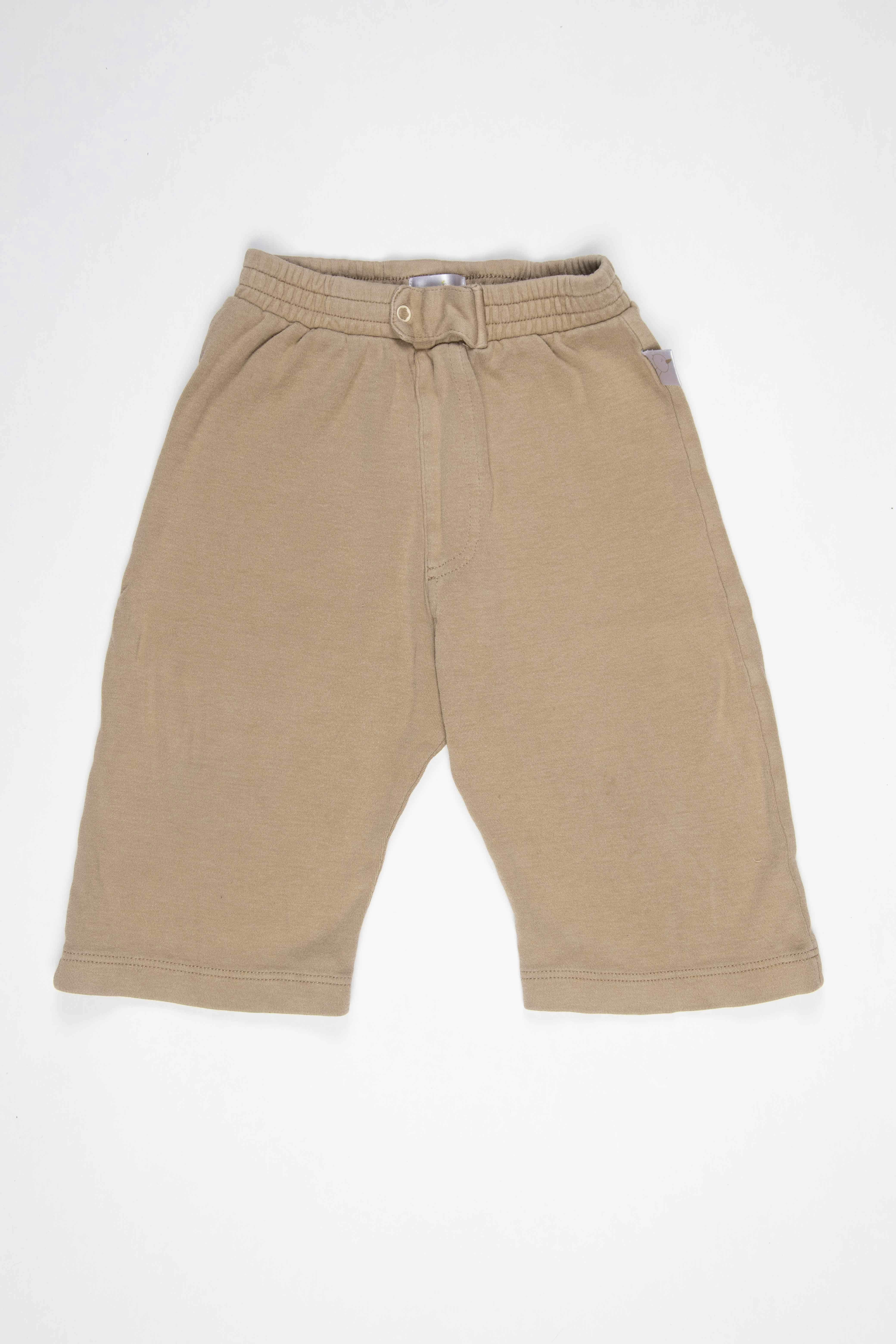 Pantalón marrón claro de algodón, broche delantero, suelto y corto. - Baby Zoo