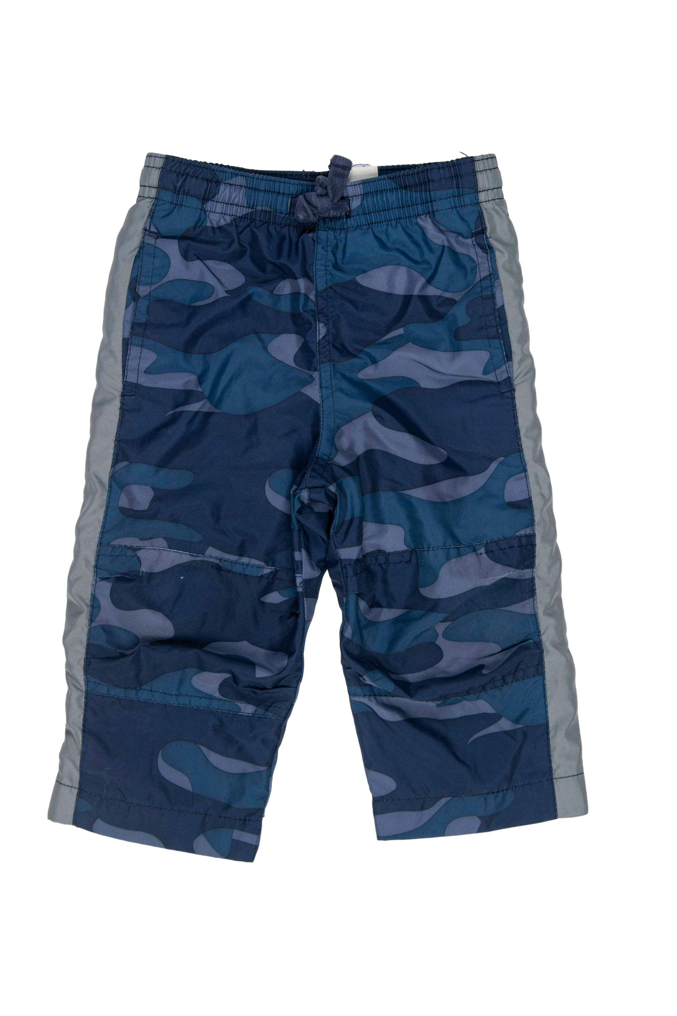 Pantalón buzo azul con detalles plomos, forrado, elástico enla cintura, cierre en las bastas - Nike