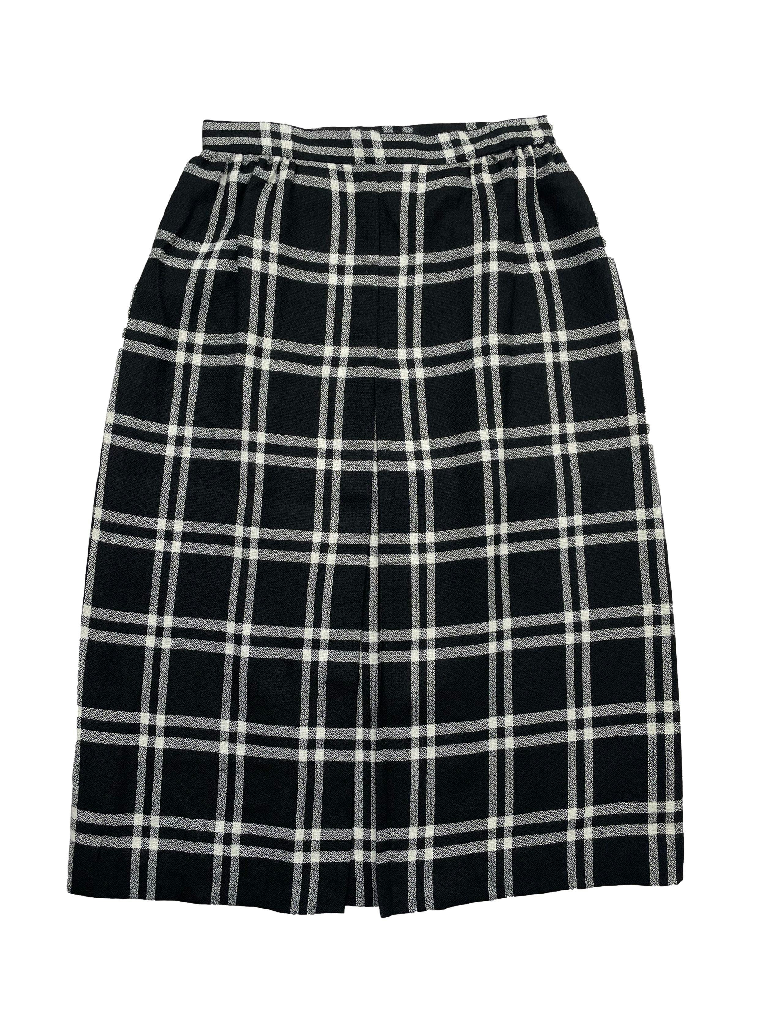 Falda midi vintage, estampado escoces en blanco y negro , pliegue central y cierre posterior. Cintura 66cm, Largo 69cm.