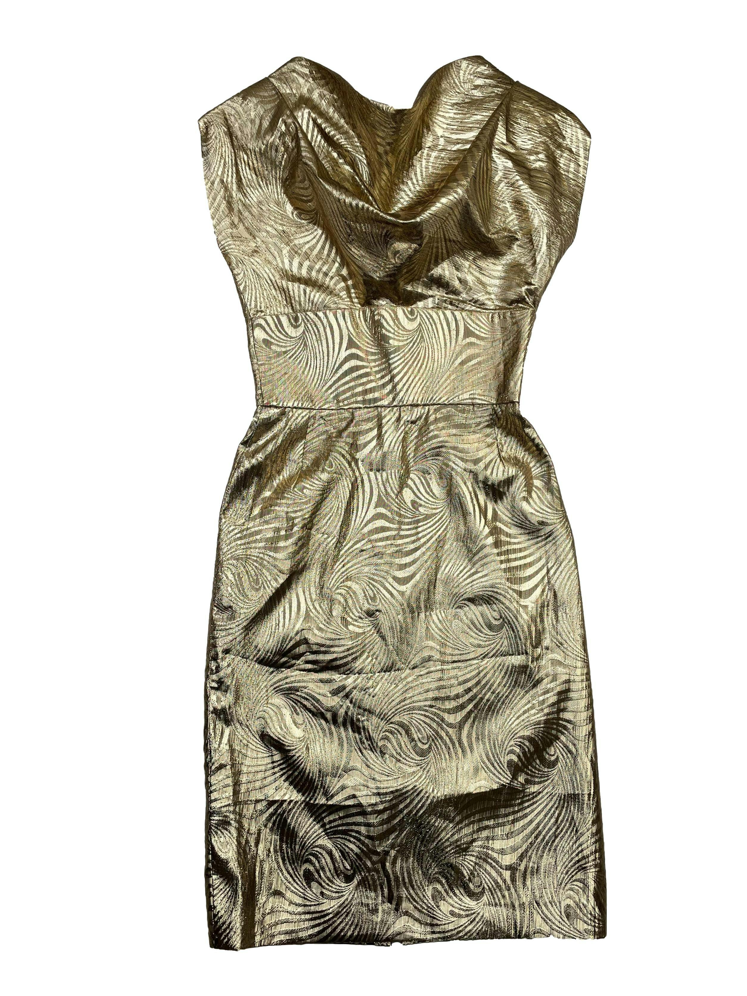 Vestido vintage dorado con forro , hombreras, cuello caído, corte en cintura y cierre posterior. Busto 90cm, Largo 105cm.