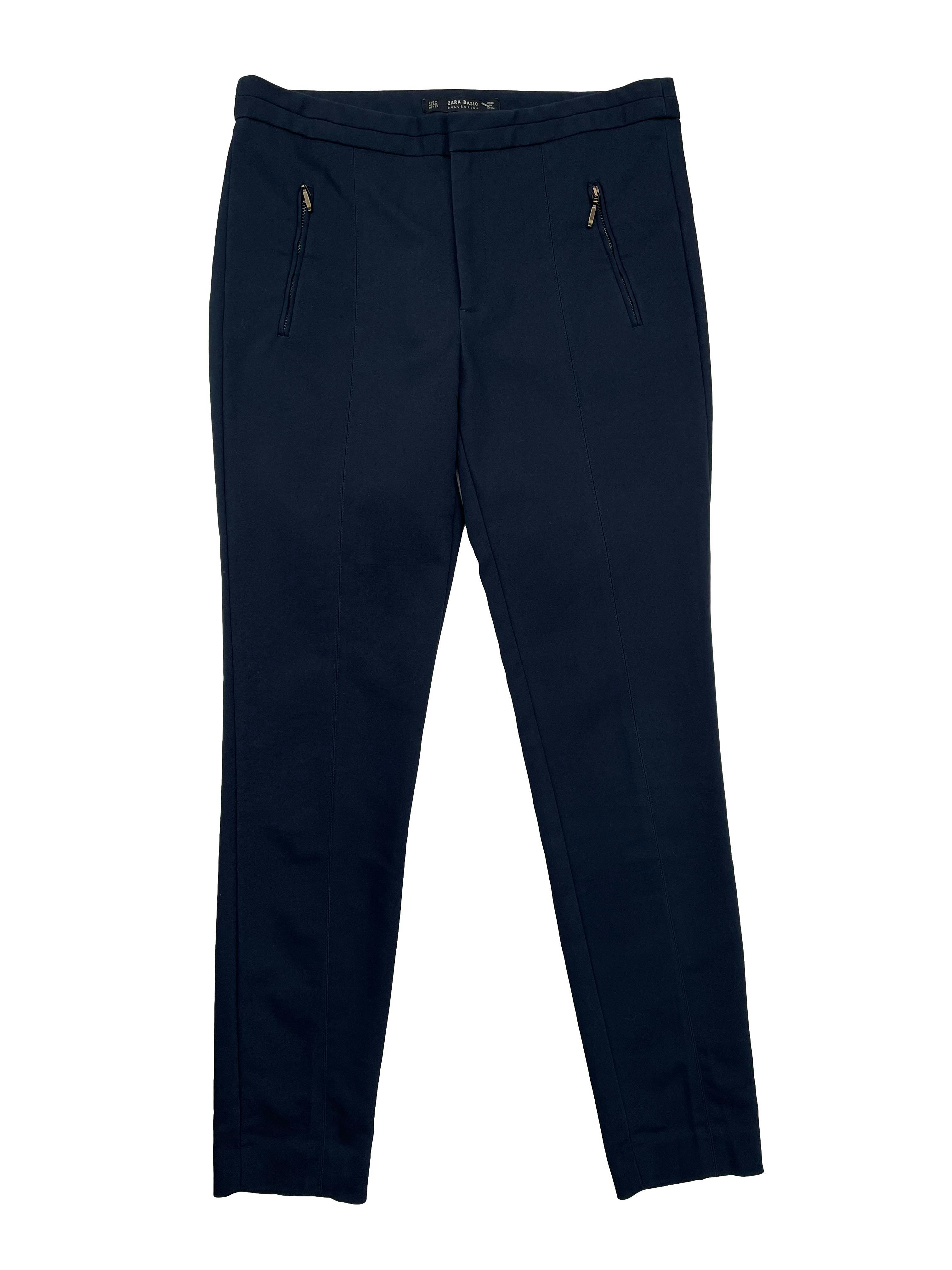 Pantalón sastre de lanilla azul marino, corte recto con tres bolsillos.  Cintura 80cm, Tiro 22cm, Largo 95cm.