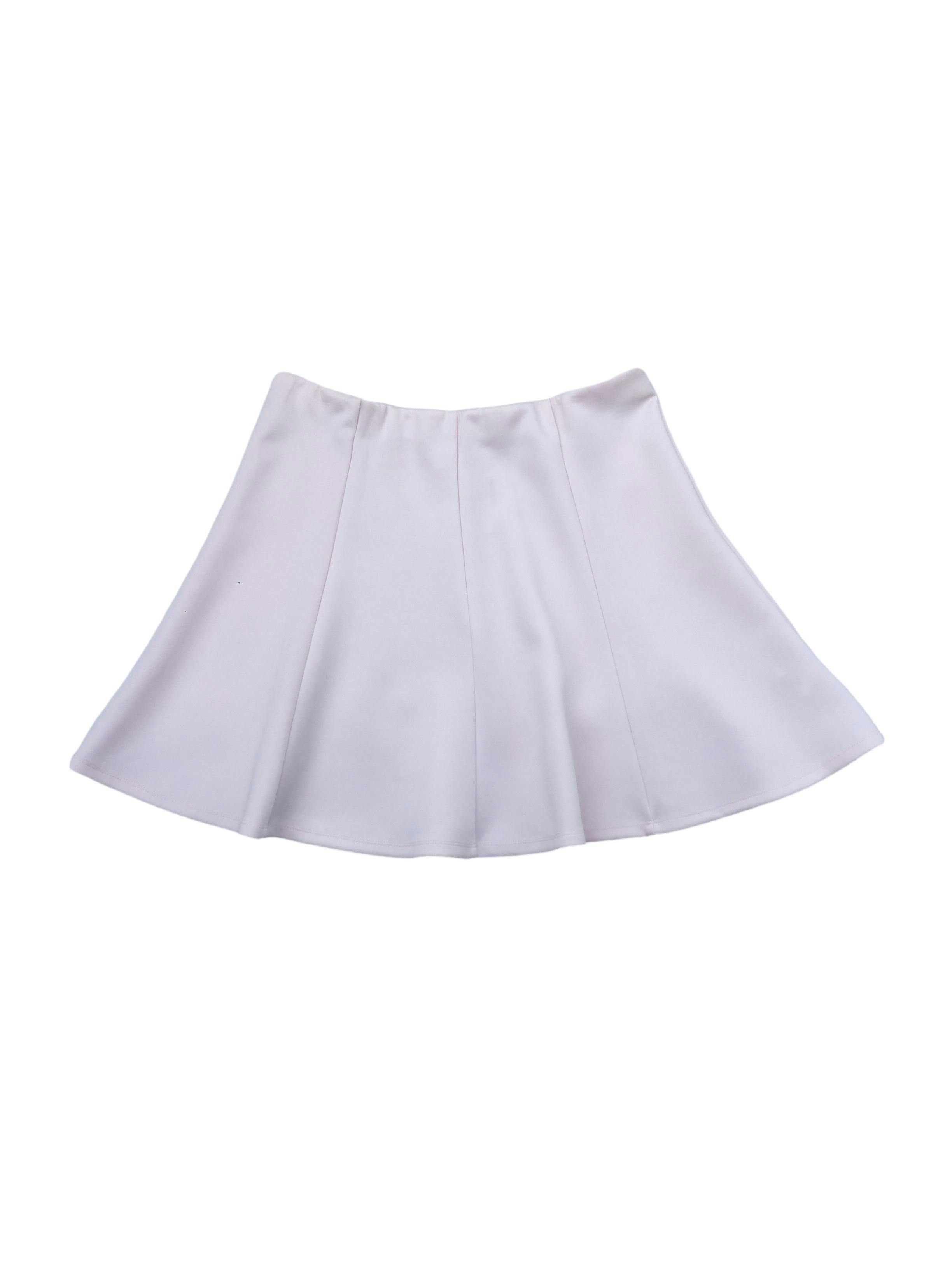 Falda semicircular Index rosa pastel, modelo a piezas con cintura elástica. Cintura 80cm sin estirar, Largo 44cm.