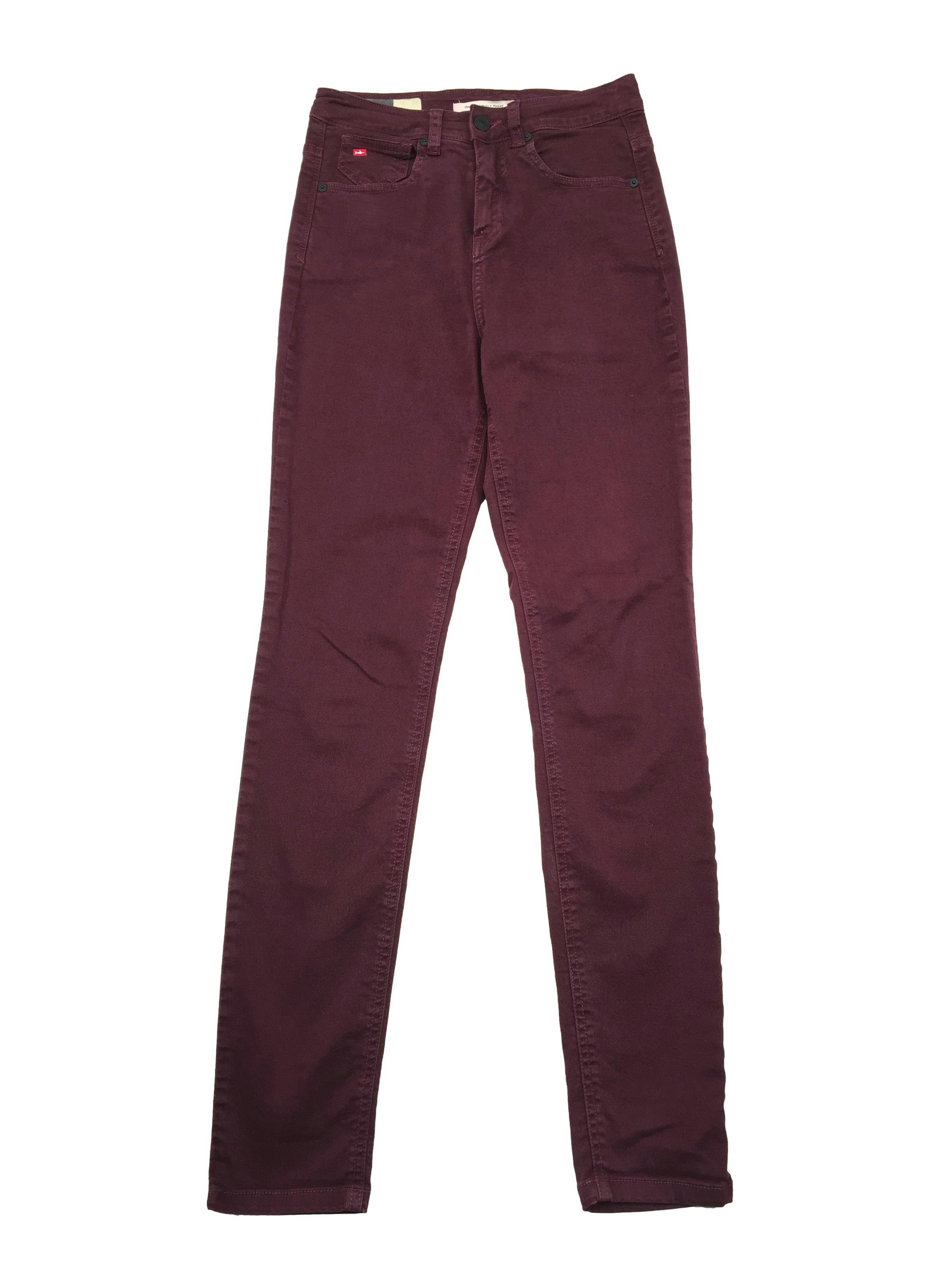 Skinny jean Kidsmadehere color vino efecto lavado, five-pockets. Cintura 68cm, Tiro 28cm, Largo 100cm.