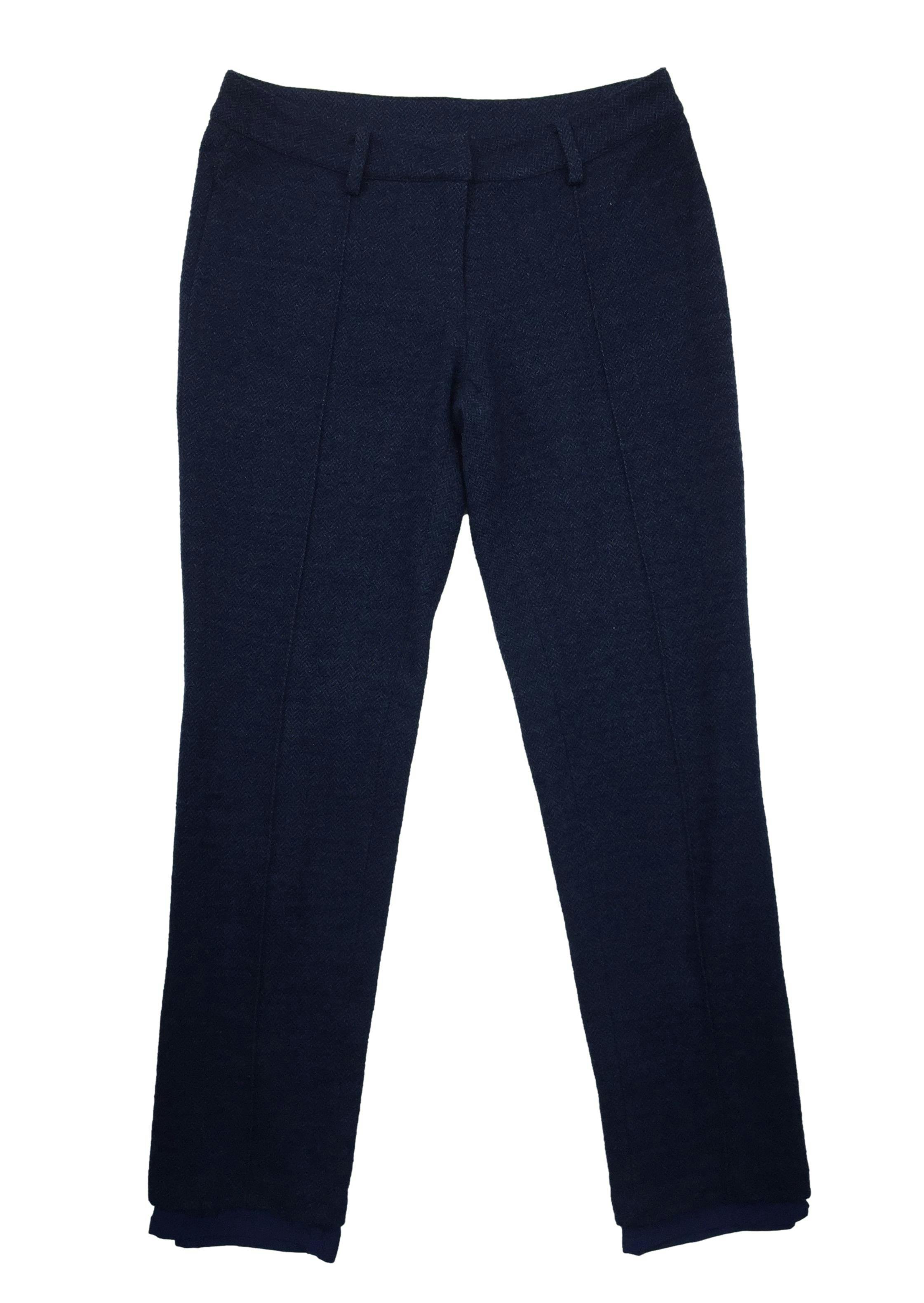 Pantalón Tommy Hilfiger azul de lanilla zig zag, forro, botón y cierre delantero. Cintura: 70cm, Tiro: 21cm, Largo: 86cm.