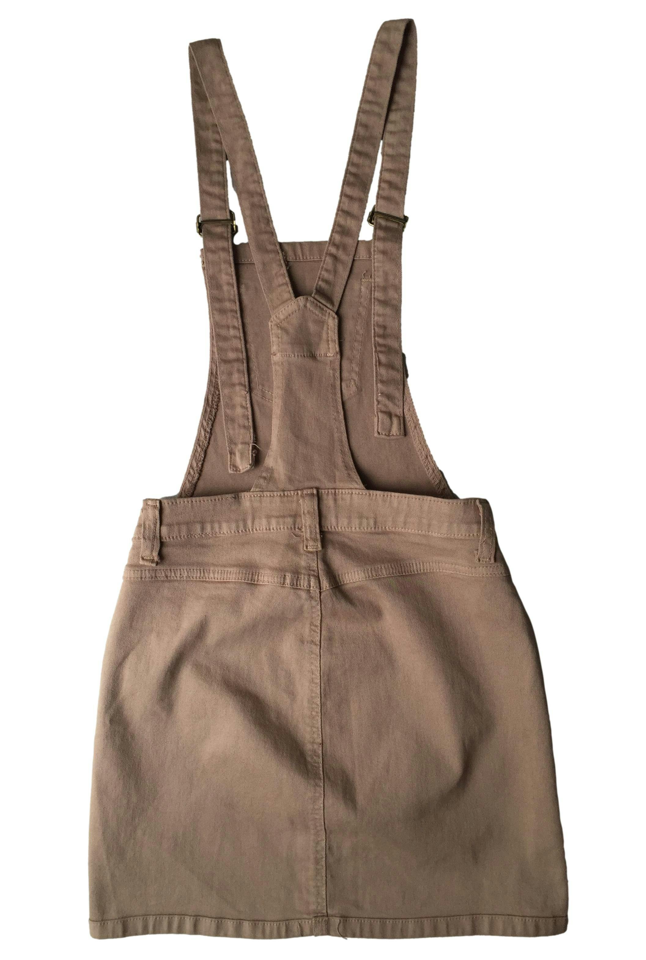 Overol falda marrón, tiras regulables, botones laterales y rasgados.  Cintura: 64cm, Largo: 81cm | Las Traperas