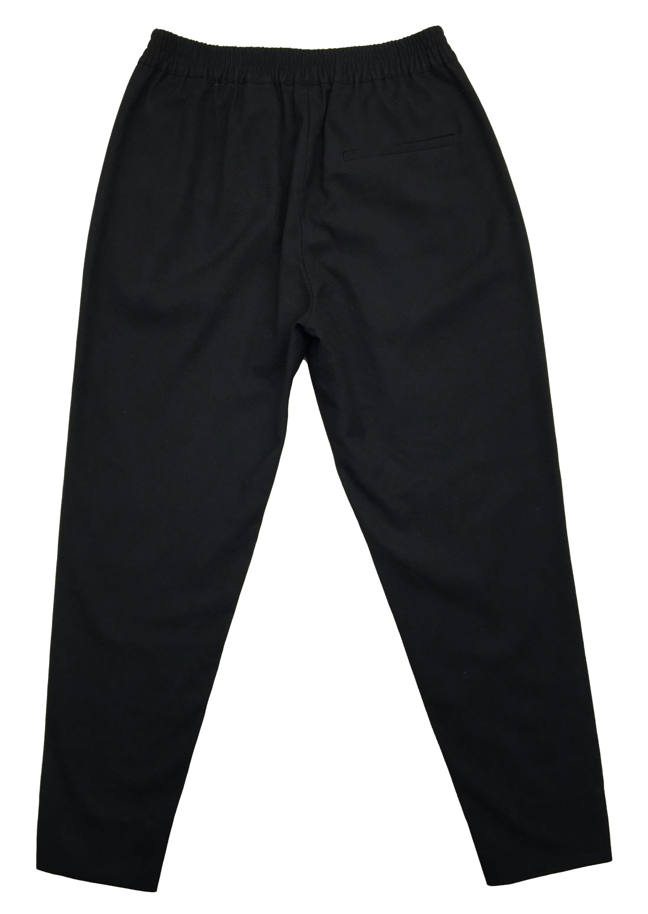 Pantalón H&M negro, elástico en la cintura y bolsillos delanteros. Cintura: 62cm (sin estirar), Tiro: 23cm, Largo: 88cm.