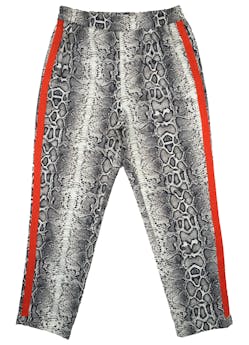 Pantalón Sybilla tipo jogger, estampado piel de serpiente y franjas naranjas en los laterales, pretina en la cintura. Cintura: 70cm (sin estirar), Tiro: 28cm, Largo: 90cm