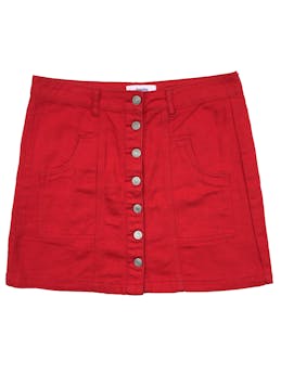 Falda Sybilla roja, botones y bolsillos delanteros. Cintura: 78cm, Largo: 40cm