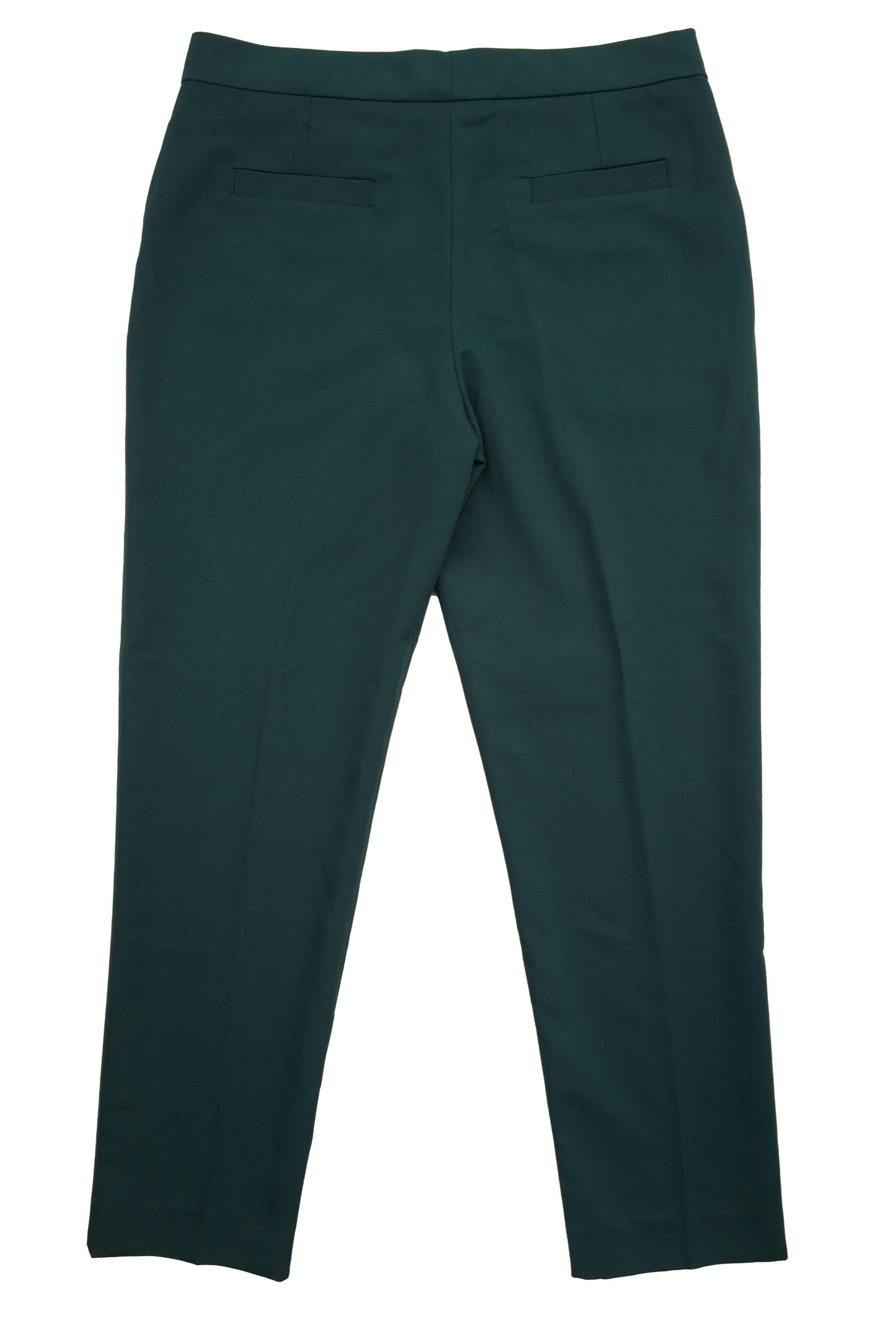 Pantalón Mango verde oscuro tipo sastre, botón y cierre delantero. Cintura: 80cm, Tiro: 28cm, Largo: 95cm