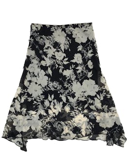 Falda ligeramente elástica, de gasa con estampado floral en blanco y negro con forro. Cintura 76 cm, largo 72 cm.