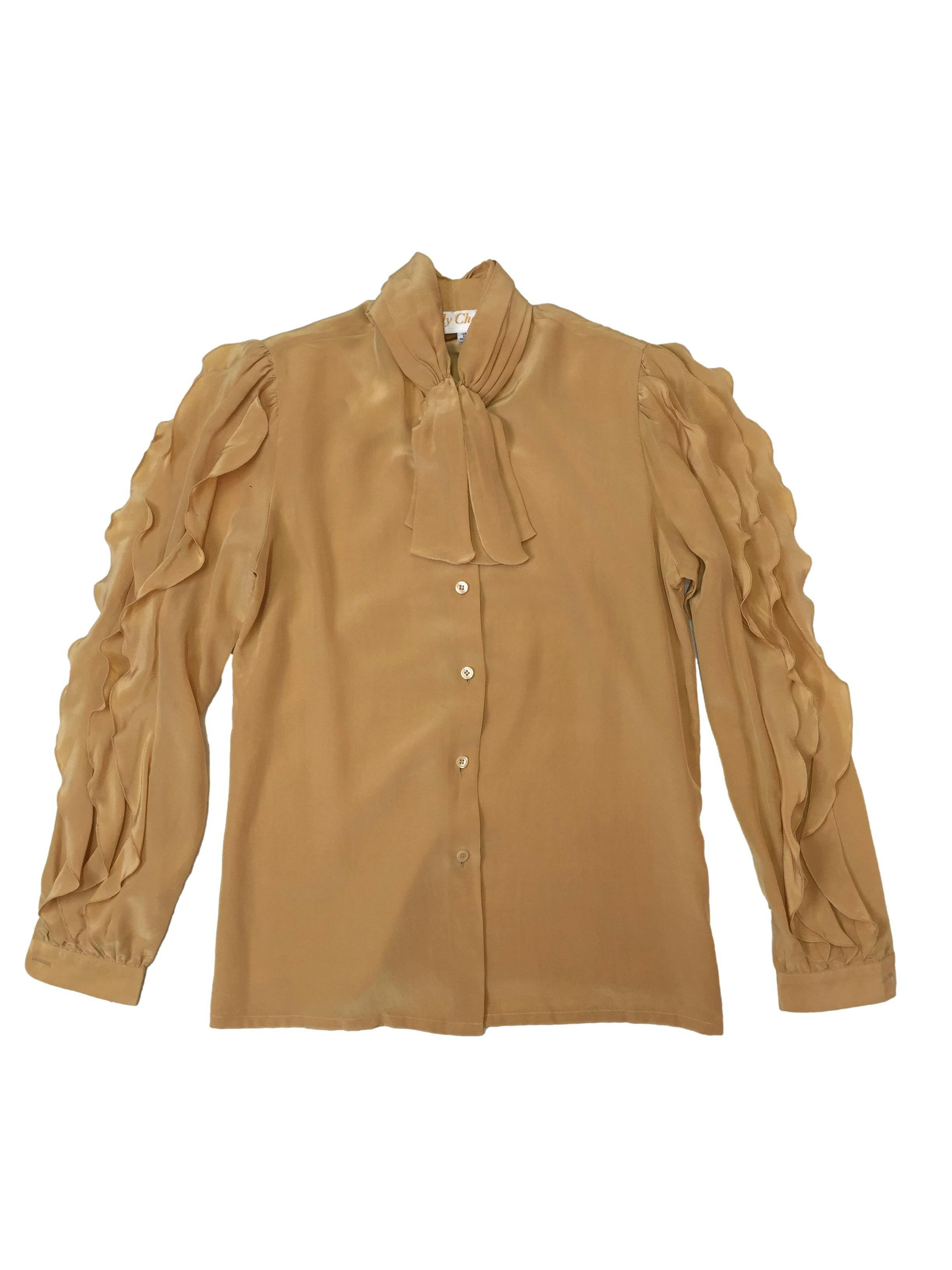 Blusa vintage 100% en color maiz, cuello drapeado con lazo, magas con volantes. Busto 94 cm y largo 60 cm 