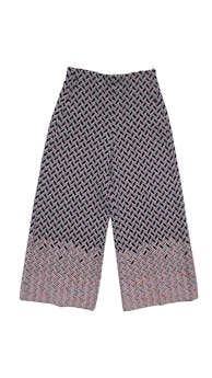 Pantalón palazo Zara, estampado geométrico en tonos naranja, negro y gris, cierre lateral invisible y bolsillos. Cintura: 66 cm, Tiro: 30 cm, Largo: 90 cm