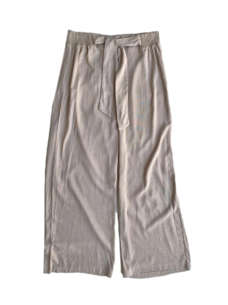 Pantalón Sybilla beige, sin bolsillos, cintura elástica,tiras para amarrar en la cintura. Cintura: 68 cm, largo: 90 cm. 