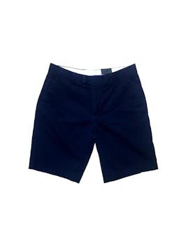 Short H&M azul marino a la rodilla, bolsillos y dos botones extras. CIntura: 74 cm Tiro: 29 cm Largo:  46 cm
